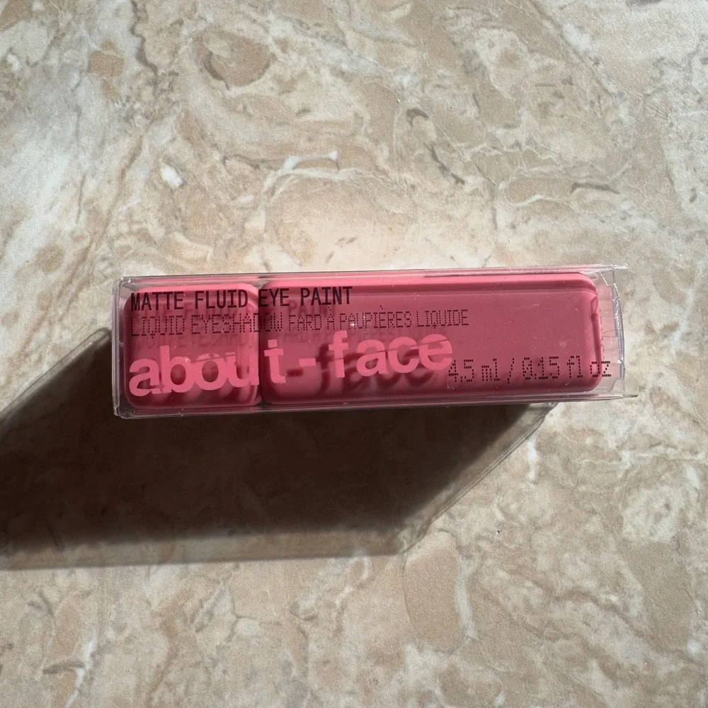about-face Matte Fluid Eye Paint Eyeshadow in La Zona Rosa neon watermelon pink
